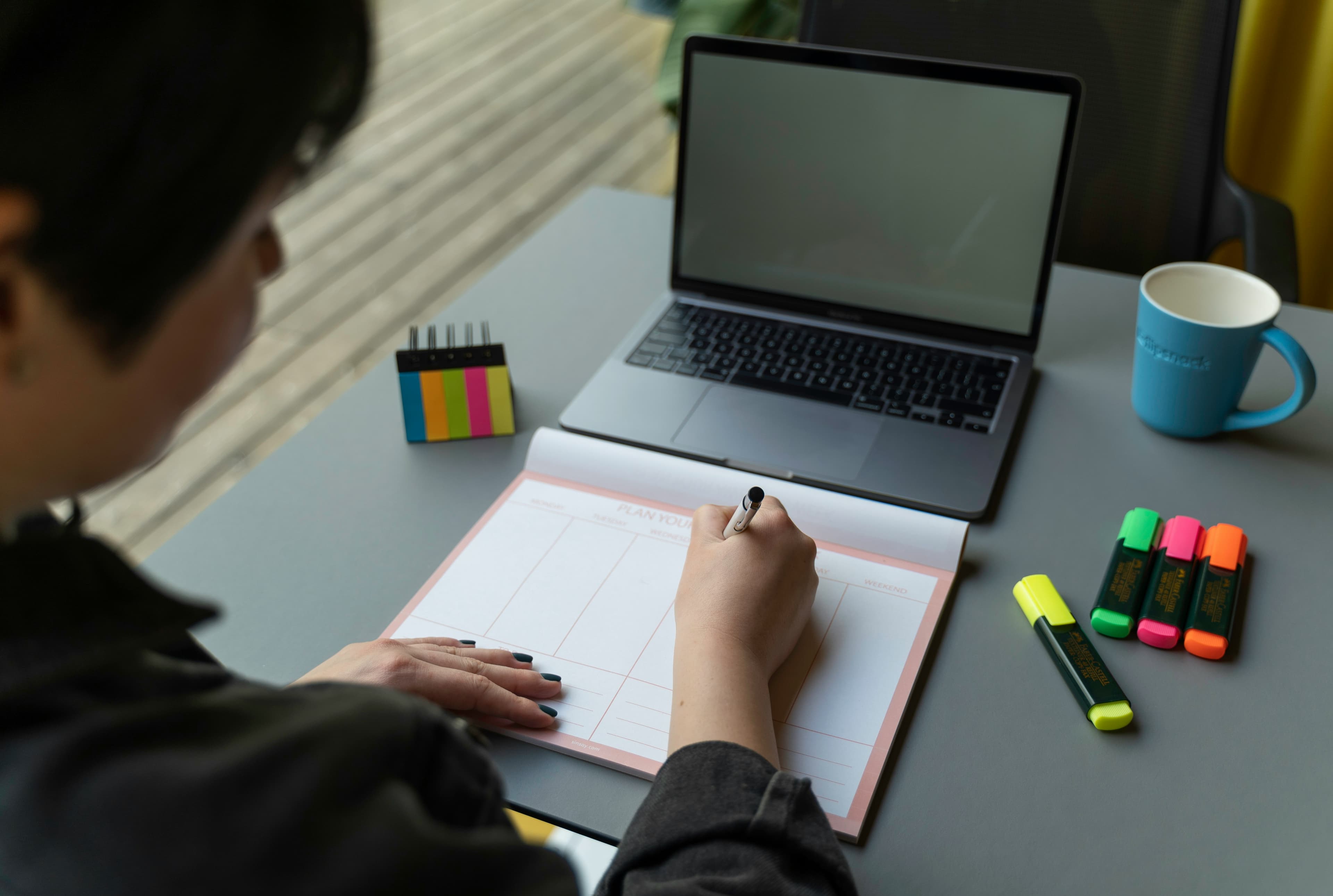 Planning a career path with a calendar and laptop